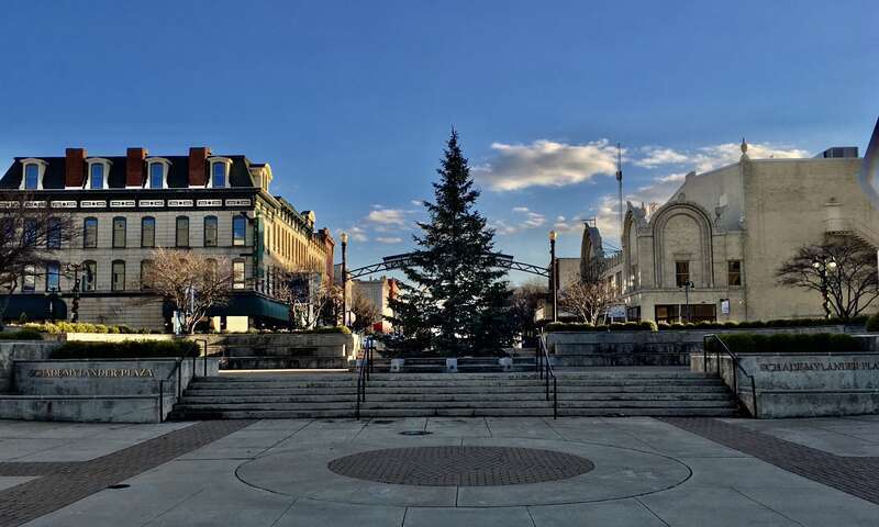 As seen in December 2020: downtown Sandusky's official Christmas tree display at Schade-Mylander Plaza. 2020's tree came from Washington Park, three blocks down Columbus Avenue, where it was &quot;outgrowing its space&quot; according to an article in the