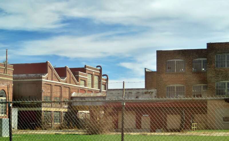 Sections 4, 9 &amp;amp; 12 in the Barber–Colman Company Historic District (1918). Section 4 housed the Machine Working Department on the first floor, the Knotter Department on the second floor, and the Die Room &amp;amp; Experimental Department on the third