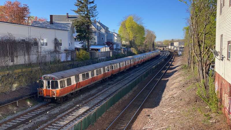Southbound Orange Line train in Malden in April 2021