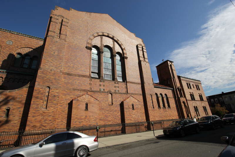 Exterior of St. Aedan’s Church, part of Saint Peter's University, from Mercer St