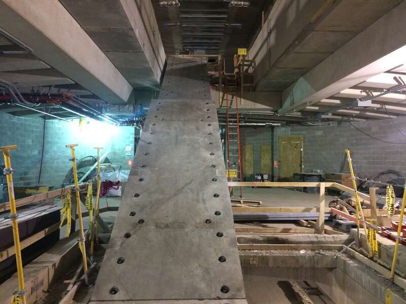 Staircase installation between the mezzanine and the lower levels of the passenger terminal. (CM007, 11-27-2018)