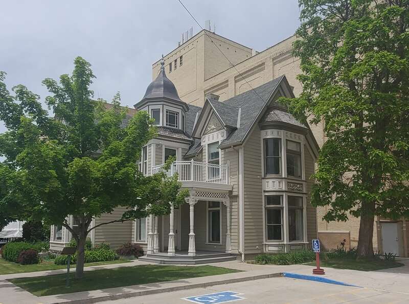 Uncertain designer, potentially Mary Ann Angell's counsin, Truman Angell, Jr., who designed neighboring buildings, such as the Cache Valley court house.