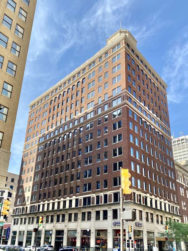 Built in 1923 and expanded to its present size in 1929, this Renaissance Revival-style skyscraper was designed by Arthur M. Atkinson for William, Jay, and Roy Thompson to serve as a commercial office building.  The building stands 15 stories and 215