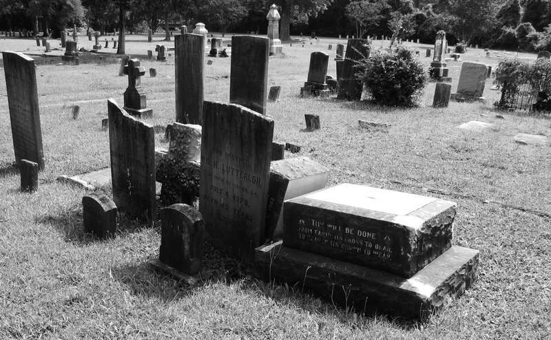 Vandalized graves at Cross Creek Cemetery in Fayetteville, North Carolina. The cemetery is on North Cool Spring Street across the street from St. Ann Roman Catholic Church and Evans Metropolitan A.M.E. Zion Church.