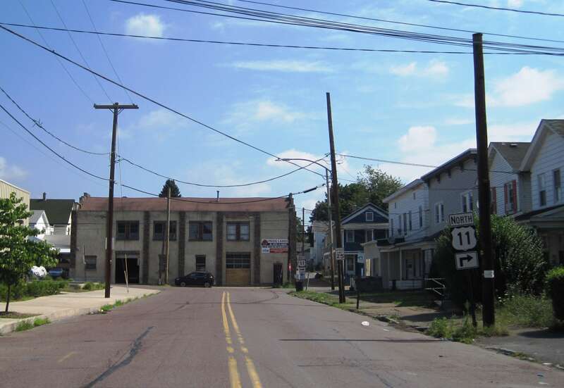 Photo of northbound U.S. Route 11 (Cedar Avenue) in Scranton, Pennsylvania. Photo taken looking northeast between Neptune Place and Birch Street.