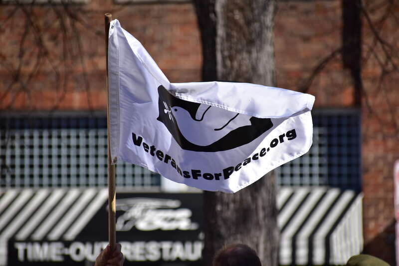 Over 50 people gather at Peace and Justice Plaza across the street from UNC-Chapel Hill to protest actions that might lead to a war with Iran.