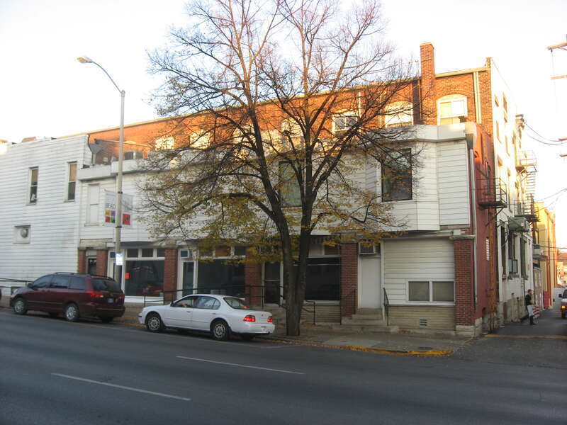 Front of the building located at 105-109 S. Walnut Street in downtown Bloomington, Indiana, United States.  Built in 1900, it is part of the Courthouse Square Historic District, a historic district that is listed on the National Register of Historic