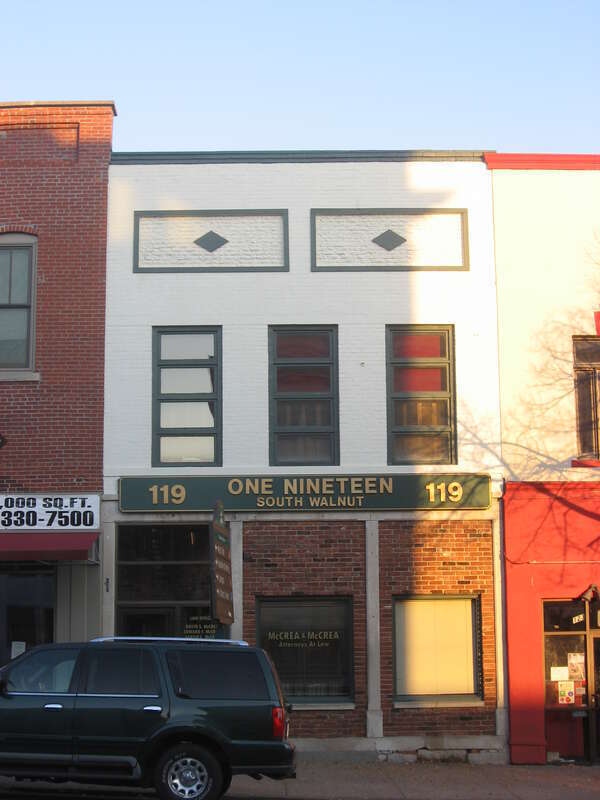 Front of the building located at 119 S. Walnut Street in downtown Bloomington, Indiana, United States.  Built in 1895, it is part of the Courthouse Square Historic District, a historic district that is listed on the National Register of Historic