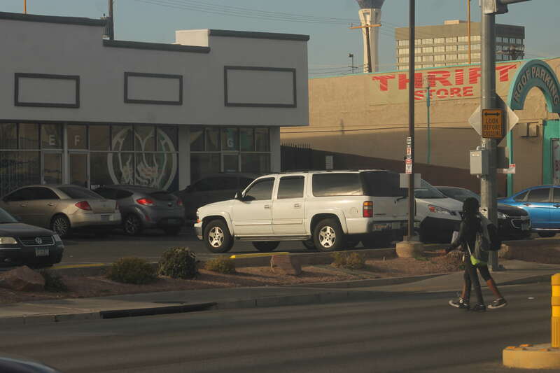 A white ninth-generation Chevrolet Suburban parked at Tymer Center in Las Vegas, Nevada.