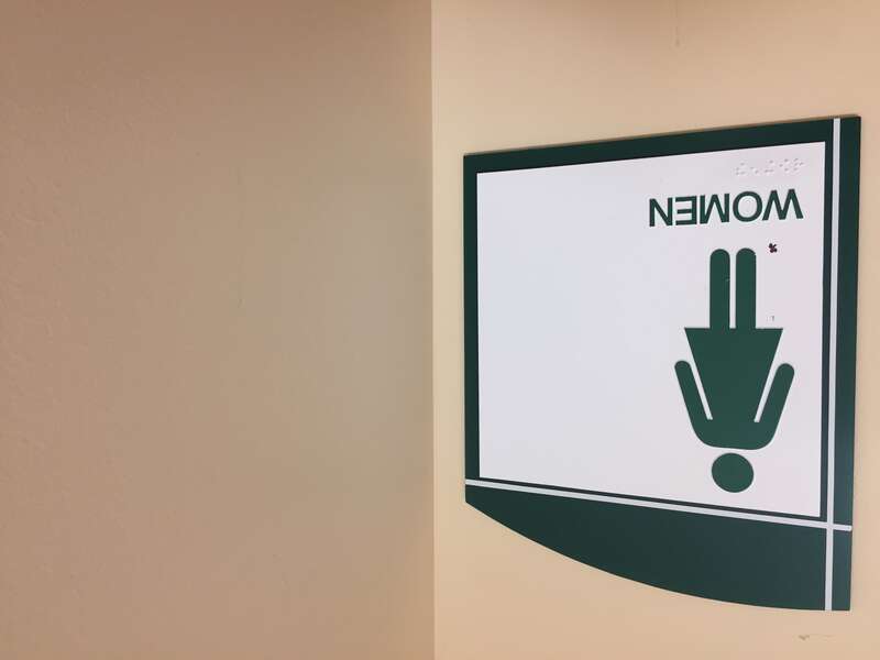 This women's restroom sign is displayed in a Southern, New Hampshire hospital.