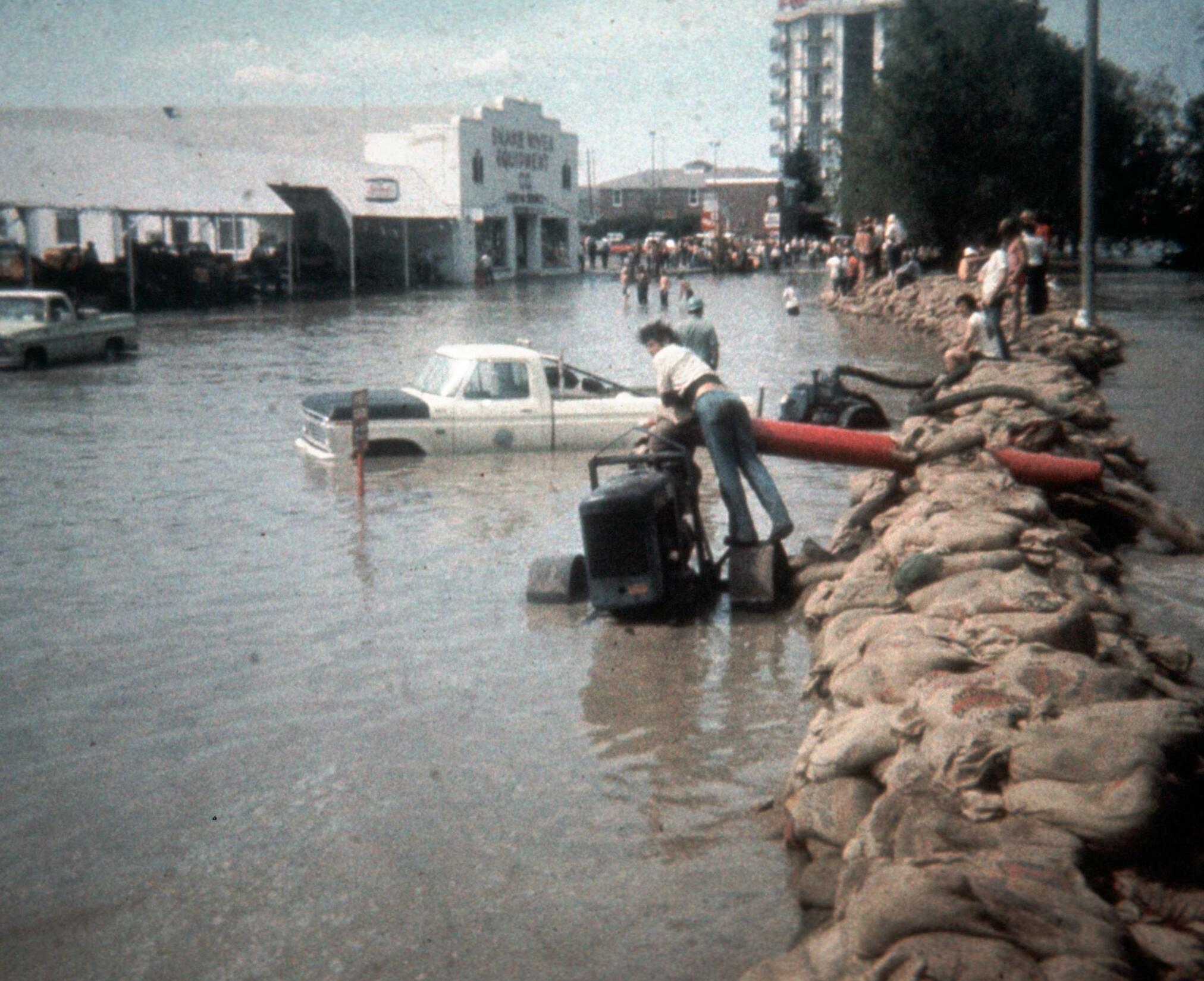 Image Title: Teton Dam Flood - Idaho Falls
Date: June 6, 1976
Place: Idaho Falls, Idaho
Description/Caption:
Medium: color transparency
Photographer/Maker: Unknown
Cite as: ID-L-0060, WaterArchives.org

Restrictions: There are no known U.S. copyright