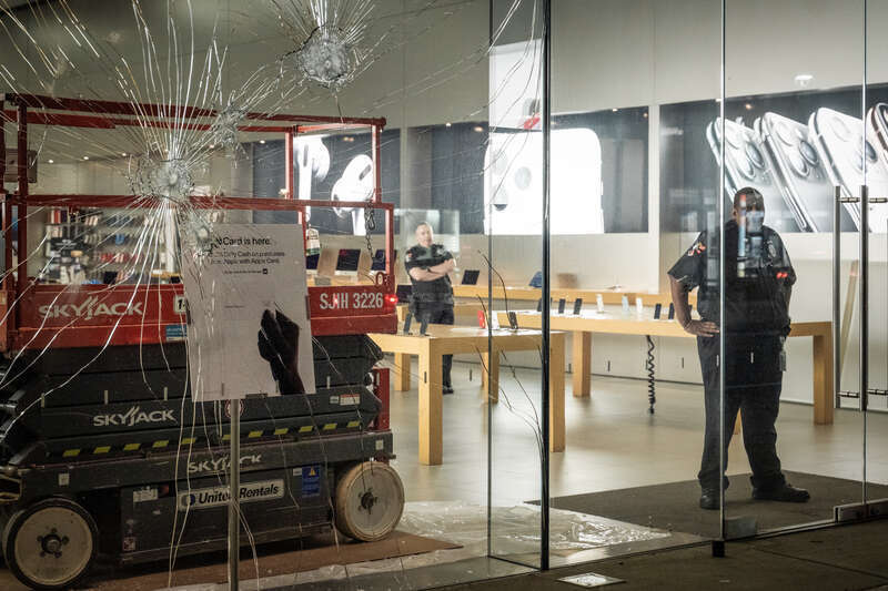 Private security inside the Apple Store on Hennepin Avenue in Minneapolis.
--
This photo is part of a continuing series covering the unrest and healing in Minneapolis following the May 25th, 2020 death of George Floyd. 
More photos: 
&amp;lt;a