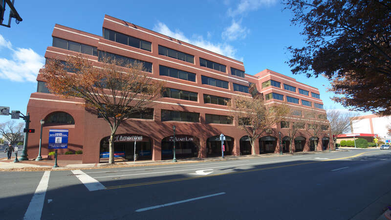 A slanted five story building on the corner of N. Washington St and W. Middle Ln. Tenants include AmeriWell physical therapy and rehabilitation, Azari Law, Gemini, and others. 110 North Washington Street, Rockville, Maryland 20850.