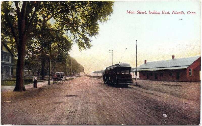 1911-ostmarked postcard of Main Street in Niantic, Connecticut, facing east. A New London &amp;amp; East Lyme Street Railway trolley is on the street; the New Haven Railroad's Niantic station is at right.