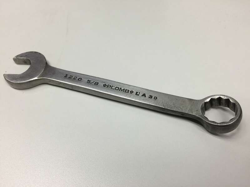 Photograph of a Plomb Tool Company 5/8&quot; Combination wrench manufactured in 1933.