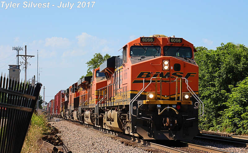 Burlington Northern Santa Fe 6066(ES44AC), 5167(C44-9W), 8159(ES44C4), 6790(ES44C4) and 689(C44-9W) Leading a Eastbound Manifest on the Emporia Sub after coming off the Olathe Connector, near the Loula Street crossing west of Kansas Avenue in Olathe,