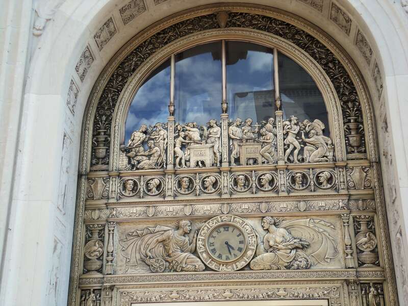 The bronze frieze above the main entrance of the First National Bank Building (US Bank) in Davenport, Iowa.  The building is listed on the National Register of Historic Places.