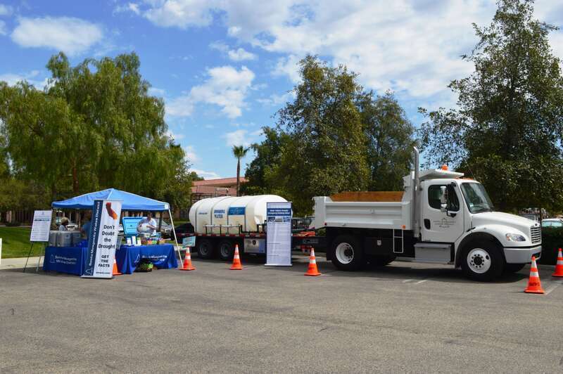 Santa Margarita Water District (SMWD) booth with a truck and a water trailer at Patriot Day 2014 - Rancho Santa Margarita, California.