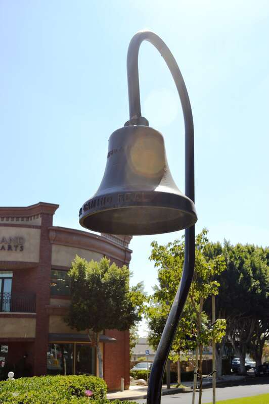 El Camino Real bell on the corner of El Camino Real and El Camino Way - Old Town Tustin, Tustin, Orange County, California.