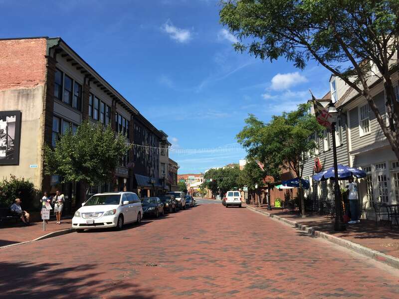 View west along Maryland State Route 450 (West Street) between Church Circle and Cathedral Street in Annapolis, Anne Arundel County, Maryland