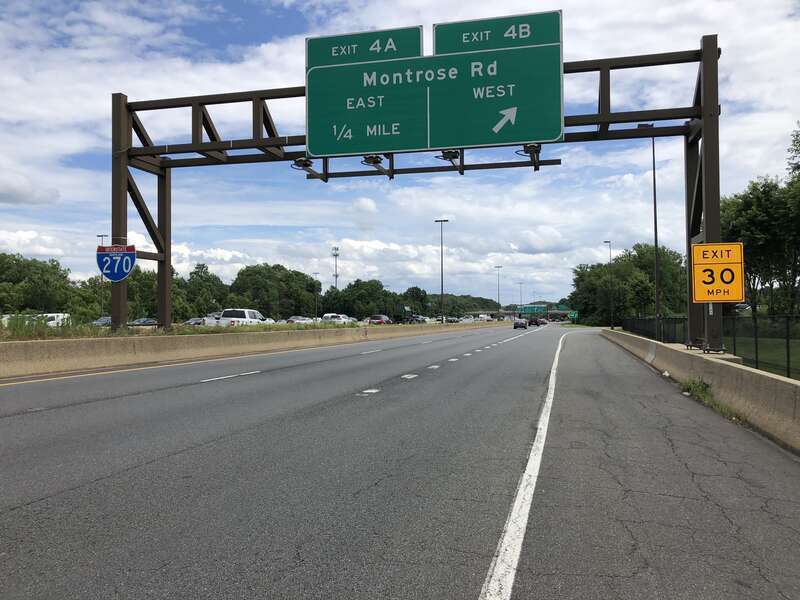 View south along the local lanes of Interstate 270 (Washington National Pike) at Exit 4B (Montrose Road WEST) on the edge of Rockville and Potomac in Montgomery County, Maryland