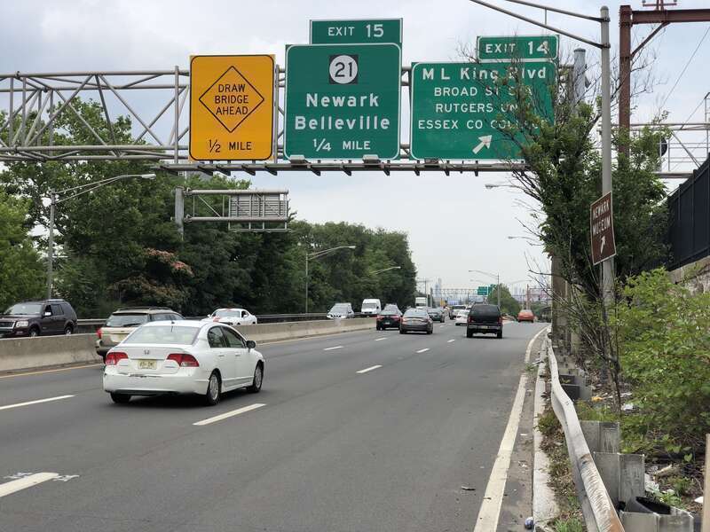 View east along Interstate 280 (Essex Freeway) at Exit 14 (Martin Luther King Boulevard, Broad Street Station, Rutgers University, Essex County College) in Newark, Essex County, New Jersey