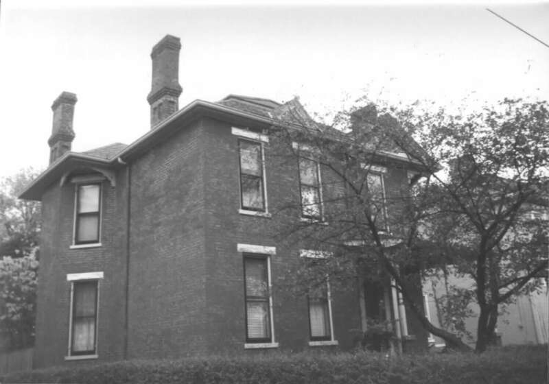 Black and white photograph of 330 Madison Place, Lexington, Kentucky. Camera angle is looking generally south.