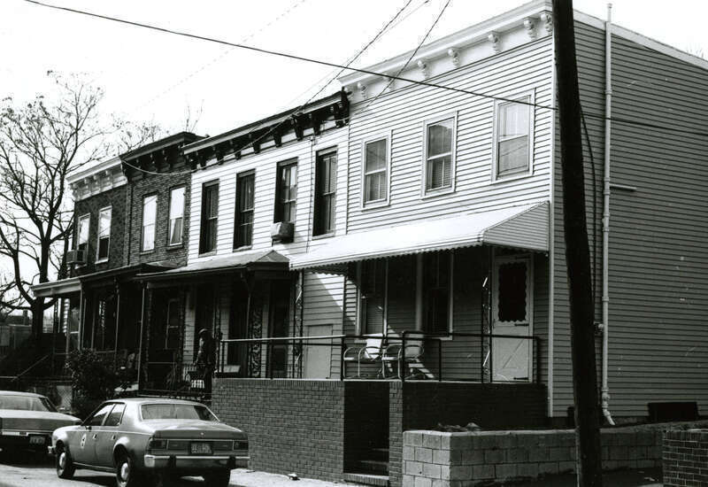 Address/Title: 606 - 608 - 610 St. Peter Street
Photographer: Zehmer, John G. (John Granderson), 1942-
Original Description (from Book): This row of Italianate farm cottages is typical of this portion of Jackson Ward north of Leigh