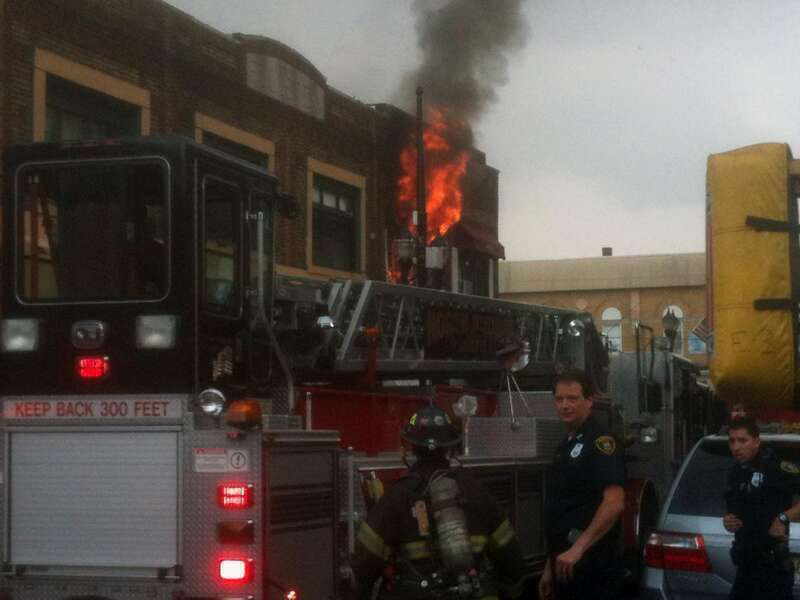 A fire at 4114 Bergenline Avenue in Union City, New Jersey on August 15, 2012. The fire started a short time before 12:45pm, when police officers first arrived on the scene, which was when I was passing by in a commuter van, and first saw what was