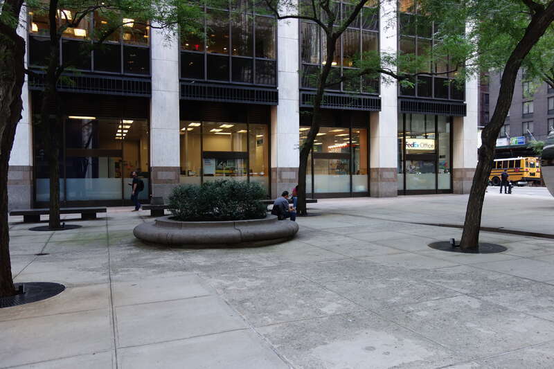 Inside 88 Pine Street Plaza, between Wall Street Plaza (88 Pine Street) and 100 Wall Street at Water Street and Pine Street in the Wall Street area of the Financial District, Manhattan.