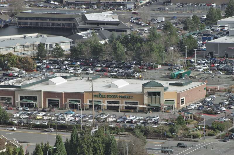 The Bellevue location of Whole Foods Market, located at NE 8th Street and 116th Avenue NE, looking east from the 26th floor of City Center East, a high-rise office building in Downtown Bellevue.