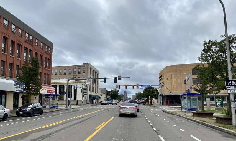 Looking westward down Broadway from just before the corner of Fillmore Avenue in Buffalo, New York on a September 2022 afternoon. Though nowadays a shell of its former self, the corner of Broadway and Fillmore at the heart of the city's traditional