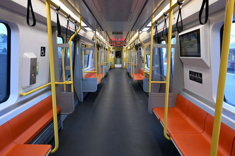 The interior of a CRRC Orange Line number 14 car at Oak Grove
