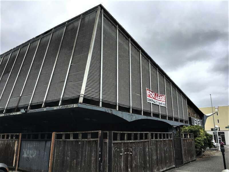Capital Savings and Loan Association Asymmetrical Googie structure is currently vacant and was most recently a nightclub.  West-northwest view.