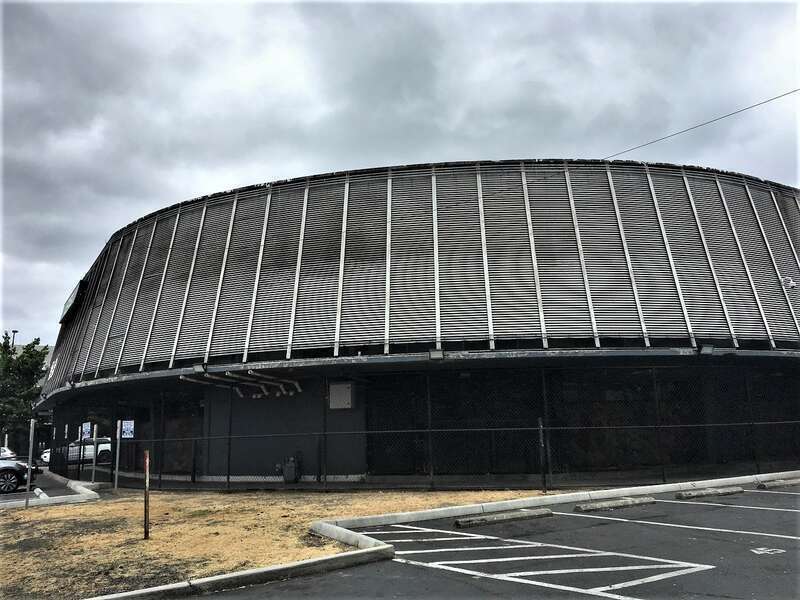 Capital Savings and Loan Association  Asymmetrical Googie structure is currently vacant and was most recently a nightclub.  Northwest view.