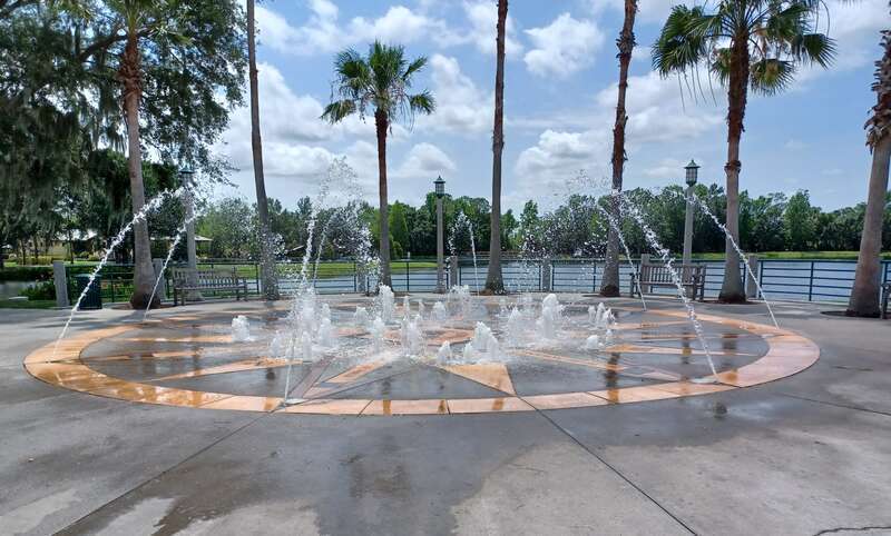 Fountain in Celebration, Florida, United States. Children can play in the fountain, and nearby there are two signs with a number of rules, including &quot;Shower before entering&quot; and &quot;Do not use the fountain if you are ill with diarrhea&quot;. Location in the
