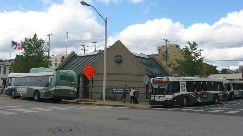 Front of the central terminal for the bus system in Bloomington, Indiana, United States.  Built in 2000, it is located on the northwestern corner of the junction of Fourth and Washington Streets; it occupies the site of the former First Baptist