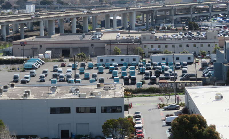 Chariot vans stored in San Francisco in February 2019 after the company ceased operations