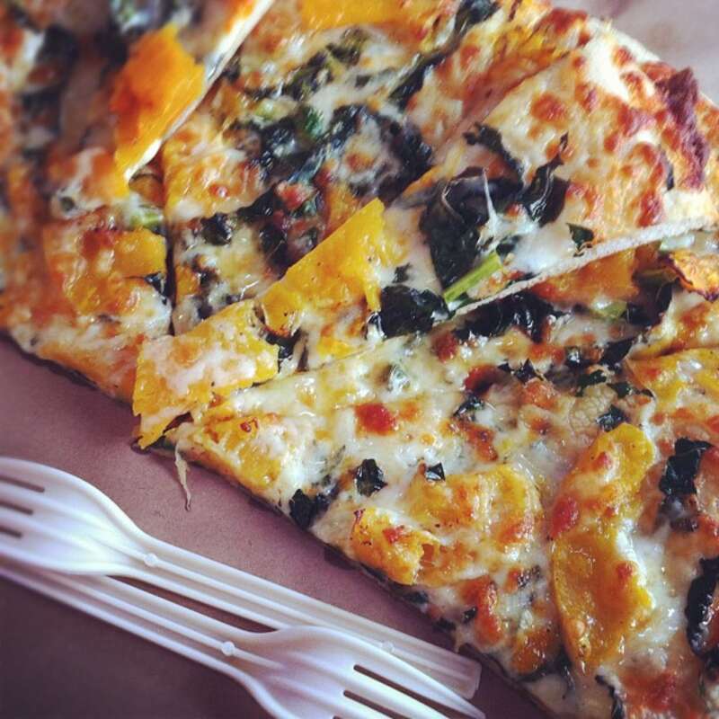Butternut squash, Dino kale, Cheddar cheese, Mozzarella, Sage oil -- from Cheeseboard Pizza Collective in Berkeley, CA.
