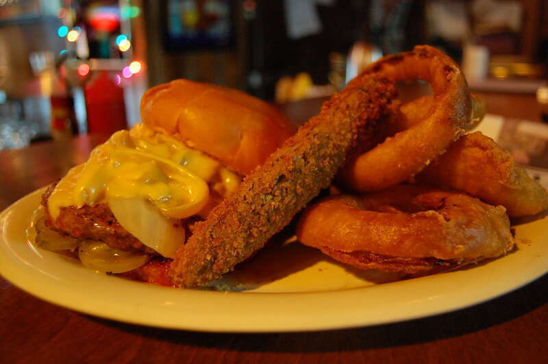 American cheese
caramelized onion
pickle

The fried pickle was particularly good today and the crispiest bits of the onion rings were good. The burger was delicious, too.