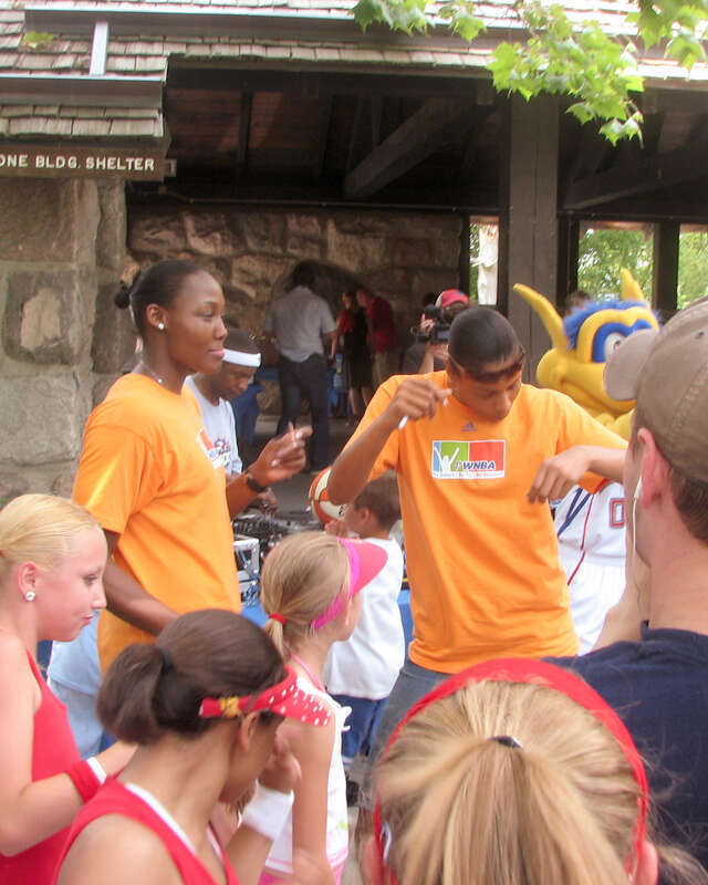 Plenette Pierson is the Shock's best dancer. Cheryl Ford tries to keep up.