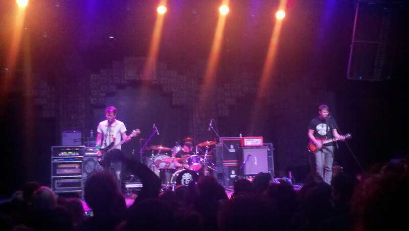 The band Cobra Skulls performing at the Mayan Theater in Los Angeles, California on March 17, 2011. Left to right: bassist/vocalist Devin Peralta, drummer Luke Swarm, and guitarist/vocalist Adam Beck.