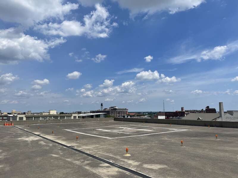 Unused terminal for the downtown Dayton heliport in summer 2022. Landing pad and terminal office are located on top of the Oregon district garage.