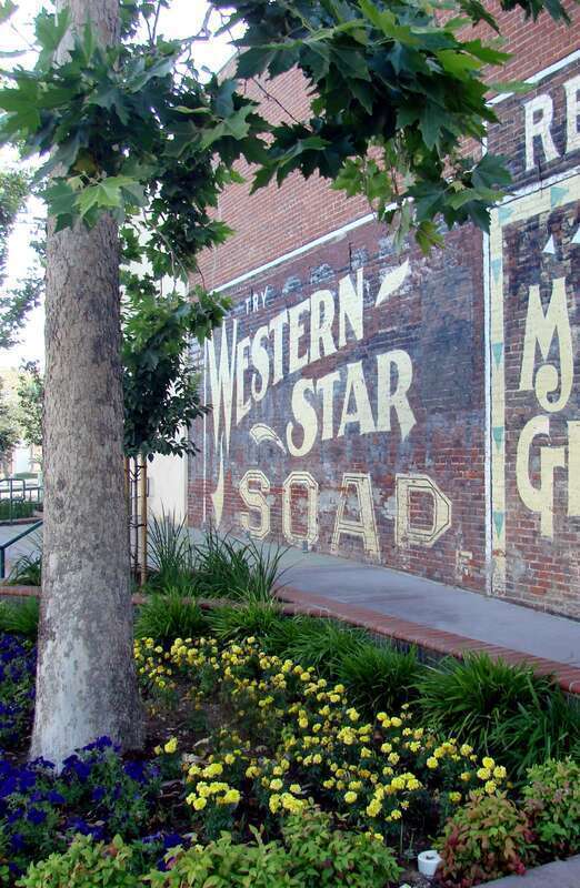 (1 in a multiple picture set)
A closer view of one of the historical murals on the side of the former Sliger's Music building at Ed Hales Park in Downtown Redlands, CA.