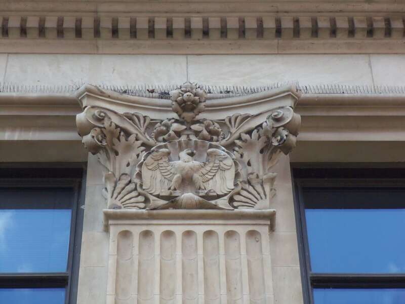 Detail showing the eagle capital on the First National Bank Building  in Davenport, Iowa.