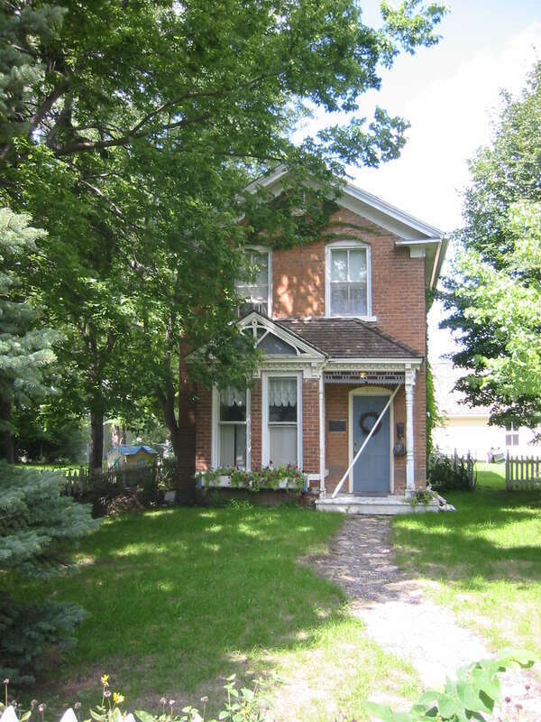 One of the two w:Early Shakopee Houses in w:Shakopee, Minnesota.