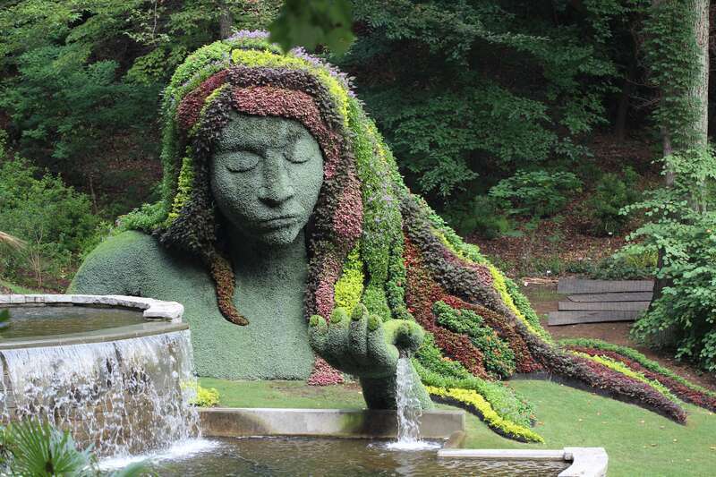 The Earth Goddess plant sculpture was created in 2013-2014 at the Atlanta Botanical Gardens' Cascades Garden by Mosaïcultures Internationales de Montréal.