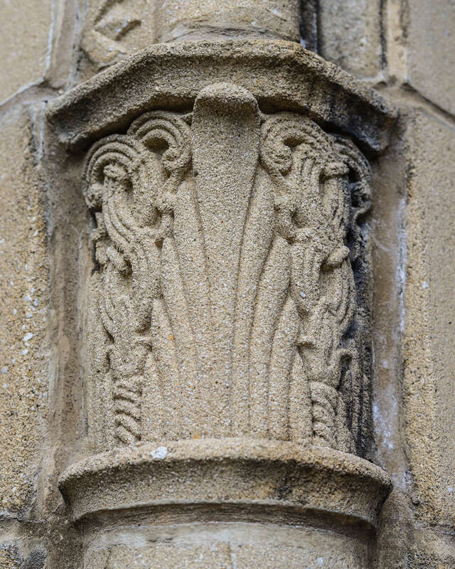 Relief in concrete between portals, Epworth United Methodist Church, originally built as Epworth Methodist Episcopal Church, 5253 N. Kenmore Ave., Chicago, Illinois. Architect: Frederick B. Townsend, 1890.