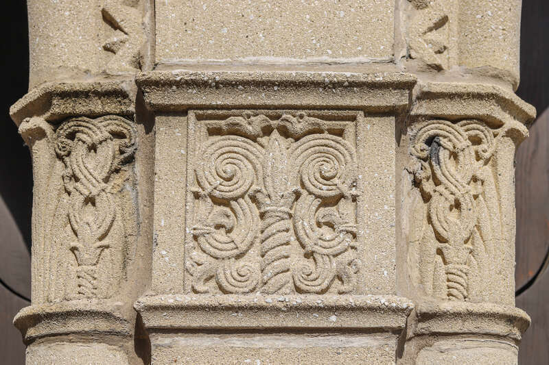 Relief in concrete between portals, Epworth United Methodist Church, originally built as Epworth Methodist Episcopal Church, 5253 N. Kenmore Ave., Chicago, Illinois. Architect: Frederick B. Townsend, 1890.