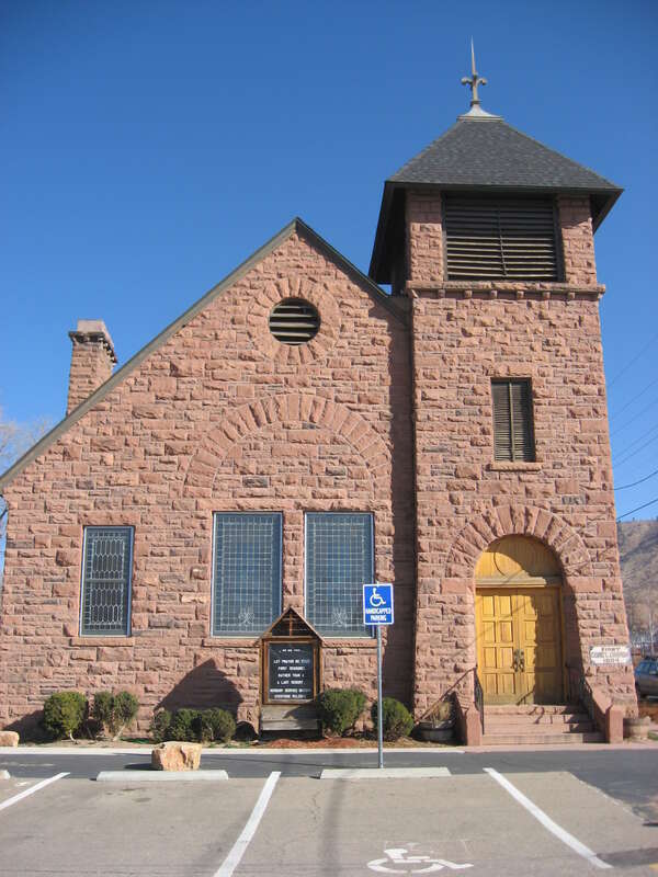 Front of the First Congregational Church of Lyons, Colorado, United States.  Located at the intersection of High and 4th Streets, the sandstone church was built in 1895.  It is listed on the National Register of Historic Places.
